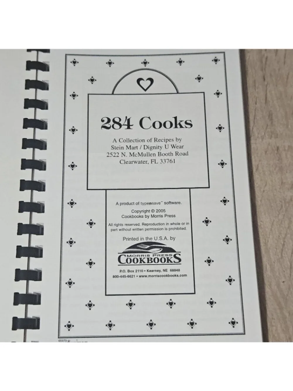 284 Cooks Steinmart/ Dignity U Wear Spiral Bound Cookbook 2005